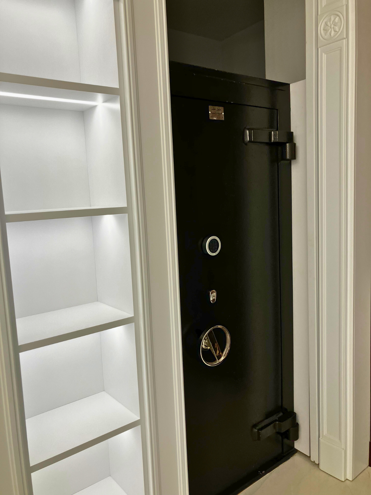 Private estate fortified safe room, concealed entry, custom hardwood shelving, Hashim Engineering Jordan, view 2